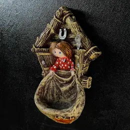 Садовая фигура - ключница из полистоуна