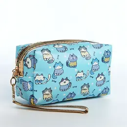 Косметичка на молнии объемная, с ручкой, маленькая, с принтом, голубая Косметичка на молнии объемная, с ручкой, маленькая, с принтом, голубая
