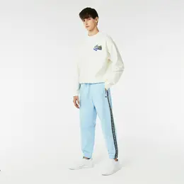 Спортивные брюки-джоггеры Lacoste в полоску с логотипом Спортивные брюки-джоггеры Lacoste в полоску с логотипом