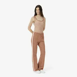 Женские расклешенные спортивные брюки Lacoste с монограммой