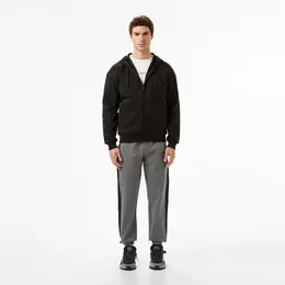 Мужские хлопковые спортивные брюки Lacoste свободного кроя