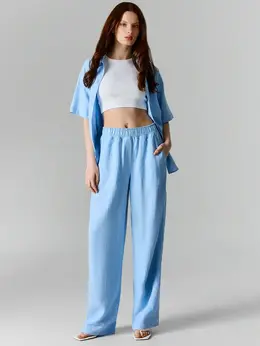 Брюки женские голубые с накладными карманами льняные